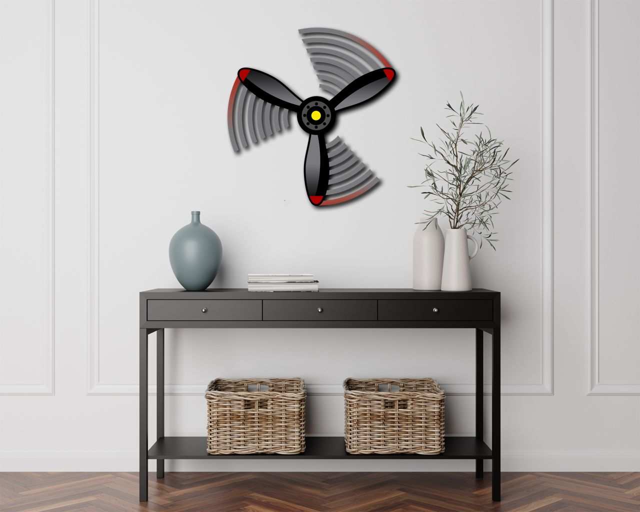 Multicolor metal sign propeller spin wall art mounted above black console table with decorative vases and wicker baskets in modern room